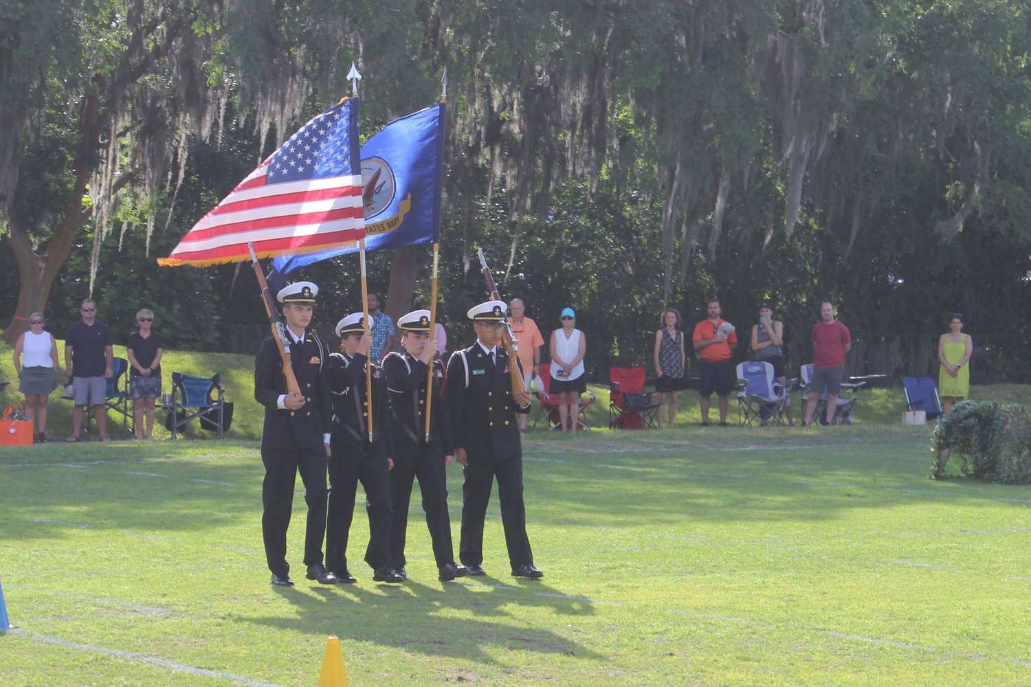 A color guard from Nease High School conducted a ceremony at The Bolles Lower School Ponte Vedra Beach Campus during a military-themed field day.